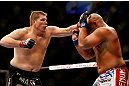 CHICAGO, IL - JANUARY 26:  Shawn Jordan (R) gets punched by Mike Russow (L) during their Heavyweight Bout part of UFC on FOX at United Center on January 26, 2013 in Chicago, Illinois.  (Photo by Josh Hedges/Zuffa LLC/Zuffa LLC Via Getty Images)