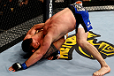 CHICAGO, IL - JANUARY 26:  Ryan Bader (L) chokes Vladimir Matyushenko (R) during their Light Heavyweight Bout part of UFC on FOX at United Center on January 26, 2013 in Chicago, Illinois.  (Photo by Al Bello/Zuffa LLC/Zuffa LLC Via Getty Images)