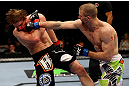 CHICAGO, IL - JANUARY 26:  Pascal Krauss (R) punches Mike Stumpf (L) during their Welterweight Bout part of UFC on FOX at United Center on January 26, 2013 in Chicago, Illinois.  (Photo by Al Bello/Zuffa LLC/Zuffa LLC Via Getty Images)