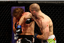 CHICAGO, IL - JANUARY 26:  Pascal Krauss (R) punches Mike Stumpf (L) during their Welterweight Bout part of UFC on FOX at United Center on January 26, 2013 in Chicago, Illinois.  (Photo by Al Bello/Zuffa LLC/Zuffa LLC Via Getty Images)