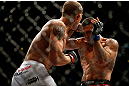 CHICAGO, IL - JANUARY 26:  Ricardo Lamas (R) fights Erik Koch (L) during their Featherweight Bout part of UFC on FOX at United Center on January 26, 2013 in Chicago, Illinois.  (Photo by Josh Hedges/Zuffa LLC/Zuffa LLC Via Getty Images)