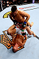 CHICAGO, IL - JANUARY 26:  Ricardo Lamas (Top) punches Erik Koch (Bottom) during their Featherweight Bout part of UFC on FOX at United Center on January 26, 2013 in Chicago, Illinois.  (Photo by Al Bello/Zuffa LLC/Zuffa LLC Via Getty Images)