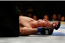 CHICAGO, IL - JANUARY 26:  Donald Cerrone lays on the ground after losing to Anthony Pettis during their Lightweight Bout part of UFC on FOX at United Center on January 26, 2013 in Chicago, Illinois.  (Photo by Josh Hedges/Zuffa LLC/Zuffa LLC Via Getty Images)
