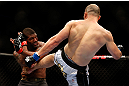 CHICAGO, IL - JANUARY 26:  Glover Teixeira (R) kicks Rampage Jackson (L) during their Light Heavyweight Bout part of UFC on FOX at United Center on January 26, 2013 in Chicago, Illinois.  (Photo by Josh Hedges/Zuffa LLC/Zuffa LLC Via Getty Images)
