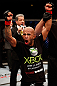 CHICAGO, IL - JANUARY 26:  Demetrious Johnson celebrates defeating John Dodson during thier Flyweight Championship Bout part of UFC on FOX at United Center on January 26, 2013 in Chicago, Illinois.  (Photo by Josh Hedges/Zuffa LLC/Zuffa LLC Via Getty Images)