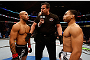 CHICAGO, IL - JANUARY 26:  John Dodson (R) face off with Demetrious Johnson (L) during thier Flyweight Championship Bout part of UFC on FOX at United Center on January 26, 2013 in Chicago, Illinois.  (Photo by Josh Hedges/Zuffa LLC/Zuffa LLC Via Getty Images)