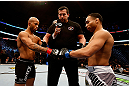 CHICAGO, IL - JANUARY 26:  John Dodson (R) taps gloves with Demetrious Johnson (L) during thier Flyweight Championship Bout part of UFC on FOX at United Center on January 26, 2013 in Chicago, Illinois.  (Photo by Josh Hedges/Zuffa LLC/Zuffa LLC Via Getty Images)