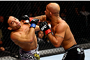 CHICAGO, IL - JANUARY 26:  John Dodson (L) fights Demetrious Johnson (R) during thier Flyweight Championship Bout part of UFC on FOX at United Center on January 26, 2013 in Chicago, Illinois.  (Photo by Al Bello/Zuffa LLC/Zuffa LLC Via Getty Images)