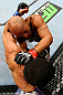 CHICAGO, IL - JANUARY 26:  Demetrious Johnson (Top) punches John Dodson (Bottom) during thier Flyweight Championship Bout part of UFC on FOX at United Center on January 26, 2013 in Chicago, Illinois.  (Photo by Al Bello/Zuffa LLC/Zuffa LLC Via Getty Images)