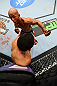 CHICAGO, IL - JANUARY 26:  Demetrious Johnson (Top) punches John Dodson (Bottom) during thier Flyweight Championship Bout part of UFC on FOX at United Center on January 26, 2013 in Chicago, Illinois.  (Photo by Al Bello/Zuffa LLC/Zuffa LLC Via Getty Images)