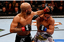 CHICAGO, IL - JANUARY 26:  Demetrious Johnson (L) punches John Dodson (R) during thier Flyweight Championship Bout part of UFC on FOX at United Center on January 26, 2013 in Chicago, Illinois.  (Photo by Josh Hedges/Zuffa LLC/Zuffa LLC Via Getty Images)