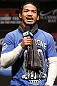 LAS VEGAS, NV - FEBRUARY 01:  UFC lightweight champion Benson Henderson interacts with fans during a Q&A session before the UFC 156 weigh-in on February 1, 2013 at Mandalay Bay Events Center in Las Vegas, Nevada.  (Photo by Josh Hedges/Zuffa LLC/Zuffa LLC via Getty Images)