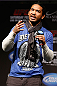 LAS VEGAS, NV - FEBRUARY 01:  UFC lightweight champion Benson Henderson interacts with fans during a Q&A session before the UFC 156 weigh-in on February 1, 2013 at Mandalay Bay Events Center in Las Vegas, Nevada.  (Photo by Josh Hedges/Zuffa LLC/Zuffa LLC via Getty Images)