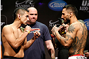 LAS VEGAS, NV - FEBRUARY 01:  (L-R) Opponents Edwin Figueroa and Francisco Rivera face off during the UFC 156 weigh-in on February 1, 2013 at Mandalay Bay Events Center in Las Vegas, Nevada.  (Photo by Josh Hedges/Zuffa LLC/Zuffa LLC via Getty Images)