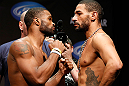 LAS VEGAS, NV - FEBRUARY 01:  (L-R) Opponents Tyron Woodley and Jay Hieron face off during the UFC 156 weigh-in on February 1, 2013 at Mandalay Bay Events Center in Las Vegas, Nevada.  (Photo by Josh Hedges/Zuffa LLC/Zuffa LLC via Getty Images)
