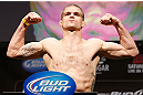 LAS VEGAS, NV - FEBRUARY 01:  Evan Dunham weighs in during the UFC 156 weigh-in on February 1, 2013 at Mandalay Bay Events Center in Las Vegas, Nevada.  (Photo by Josh Hedges/Zuffa LLC/Zuffa LLC via Getty Images)