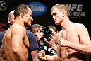 LAS VEGAS, NV - FEBRUARY 01:  (L-R) Opponents Gleison Tibau and Evan Dunham face off during the UFC 156 weigh-in on February 1, 2013 at Mandalay Bay Events Center in Las Vegas, Nevada.  (Photo by Josh Hedges/Zuffa LLC/Zuffa LLC via Getty Images)