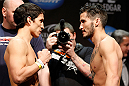 LAS VEGAS, NV - FEBRUARY 01:  (L-R) Opponents Joseph Benavidez and Ian McCall face off during the UFC 156 weigh-in on February 1, 2013 at Mandalay Bay Events Center in Las Vegas, Nevada.  (Photo by Josh Hedges/Zuffa LLC/Zuffa LLC via Getty Images)