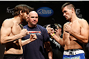 LAS VEGAS, NV - FEBRUARY 01:  (L-R) Opponents Jon Fitch and Demian Maia face off during the UFC 156 weigh-in on February 1, 2013 at Mandalay Bay Events Center in Las Vegas, Nevada.  (Photo by Josh Hedges/Zuffa LLC/Zuffa LLC via Getty Images)