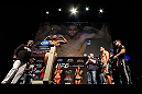 LAS VEGAS, NV - FEBRUARY 01:  Rashad Evans weighs in as opponent Antonio Rogerio Nogueira looks on during the UFC 156 weigh-in on February 1, 2013 at Mandalay Bay Events Center in Las Vegas, Nevada.  (Photo by Josh Hedges/Zuffa LLC/Zuffa LLC via Getty Images)