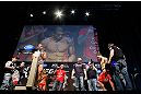 LAS VEGAS, NV - FEBRUARY 01:  Jose Aldo weighs in as opponent Frankie Edgar looks on during the UFC 156 weigh-in on February 1, 2013 at Mandalay Bay Events Center in Las Vegas, Nevada.  (Photo by Josh Hedges/Zuffa LLC/Zuffa LLC via Getty Images)
