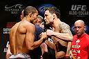 LAS VEGAS, NV - FEBRUARY 01:  (L-R) Opponents Jose Aldo and Frankie Edgar face off during the UFC 156 weigh-in on February 1, 2013 at Mandalay Bay Events Center in Las Vegas, Nevada.  (Photo by Josh Hedges/Zuffa LLC/Zuffa LLC via Getty Images)