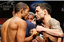 LAS VEGAS, NV - FEBRUARY 01:  (L-R) Opponents Jose Aldo and Frankie Edgar face off during the UFC 156 weigh-in on February 1, 2013 at Mandalay Bay Events Center in Las Vegas, Nevada.  (Photo by Josh Hedges/Zuffa LLC/Zuffa LLC via Getty Images)