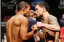 LAS VEGAS, NV - FEBRUARY 01:  (L-R) Opponents Jose Aldo and Frankie Edgar face off during the UFC 156 weigh-in on February 1, 2013 at Mandalay Bay Events Center in Las Vegas, Nevada.  (Photo by Josh Hedges/Zuffa LLC/Zuffa LLC via Getty Images)