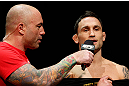 LAS VEGAS, NV - FEBRUARY 01:  (R-L) Frankie Edgar is interviewed by Joe Rogan during the UFC 156 weigh-in on February 1, 2013 at Mandalay Bay Events Center in Las Vegas, Nevada.  (Photo by Josh Hedges/Zuffa LLC/Zuffa LLC via Getty Images)