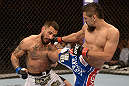 LAS VEGAS, NV - FEBRUARY 02:  (R-L) Edwin Figueroa kicks Francisco Rivera during their bantamweight fight at UFC 156 on February 2, 2013 at the Mandalay Bay Events Center in Las Vegas, Nevada.  (Photo by Donald Miralle/Zuffa LLC/Zuffa LLC via Getty Images) *** Local Caption *** Francisco Rivera; Edwin Figueroa