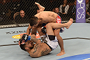 LAS VEGAS, NV - FEBRUARY 02:  Edwin Figueroa (top) punches Francisco Rivera during their bantamweight fight at UFC 156 on February 2, 2013 at the Mandalay Bay Events Center in Las Vegas, Nevada.  (Photo by Donald Miralle/Zuffa LLC/Zuffa LLC via Getty Images) *** Local Caption *** Francisco Rivera; Edwin Figueroa