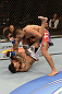 LAS VEGAS, NV - FEBRUARY 02:  Edwin Figueroa (top) punches Francisco Rivera during their bantamweight fight at UFC 156 on February 2, 2013 at the Mandalay Bay Events Center in Las Vegas, Nevada.  (Photo by Donald Miralle/Zuffa LLC/Zuffa LLC via Getty Images) *** Local Caption *** Francisco Rivera; Edwin Figueroa