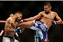 LAS VEGAS, NV - FEBRUARY 02:  (R-L) Edwin Figueroa kicks Francisco Rivera during their bantamweight fight at UFC 156 on February 2, 2013 at the Mandalay Bay Events Center in Las Vegas, Nevada.  (Photo by Josh Hedges/Zuffa LLC/Zuffa LLC via Getty Images) *** Local Caption *** Francisco Rivera; Edwin Figueroa