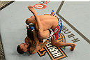 LAS VEGAS, NV - FEBRUARY 02:  Francisco Rivera (bottom) attempts to submit Edwin Figueroa during their bantamweight fight at UFC 156 on February 2, 2013 at the Mandalay Bay Events Center in Las Vegas, Nevada.  (Photo by Donald Miralle/Zuffa LLC/Zuffa LLC via Getty Images) *** Local Caption *** Francisco Rivera; Edwin Figueroa