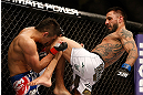LAS VEGAS, NV - FEBRUARY 02:  (R-L) Francisco Rivera knees Edwin Figueroa during their bantamweight fight at UFC 156 on February 2, 2013 at the Mandalay Bay Events Center in Las Vegas, Nevada.  (Photo by Josh Hedges/Zuffa LLC/Zuffa LLC via Getty Images) *** Local Caption *** Francisco Rivera; Edwin Figueroa