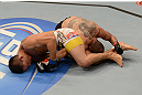 LAS VEGAS, NV - FEBRUARY 02:  (L-R) Dustin Kimura attempts to submit Chico Camus during their bantamweight fight at UFC 156 on February 2, 2013 at the Mandalay Bay Events Center in Las Vegas, Nevada.  (Photo by Donald Miralle/Zuffa LLC/Zuffa LLC via Getty Images) *** Local Caption *** Chico Camus; Dustin Kimura