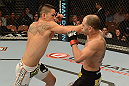 LAS VEGAS, NV - FEBRUARY 02:  (L-R) Dustin Kimura punches Chico Camus during their bantamweight fight at UFC 156 on February 2, 2013 at the Mandalay Bay Events Center in Las Vegas, Nevada.  (Photo by Donald Miralle/Zuffa LLC/Zuffa LLC via Getty Images) *** Local Caption *** Chico Camus; Dustin Kimura