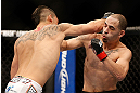 LAS VEGAS, NV - FEBRUARY 02:  (L-R) Dustin Kimura punches Chico Camus during their bantamweight fight at UFC 156 on February 2, 2013 at the Mandalay Bay Events Center in Las Vegas, Nevada.  (Photo by Josh Hedges/Zuffa LLC/Zuffa LLC via Getty Images) *** Local Caption *** Chico Camus; Dustin Kimura