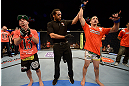 LAS VEGAS, NV - FEBRUARY 02:  Dustin Kimura (right) reacts to his victory over Chico Camus (left) after their bantamweight fight at UFC 156 on February 2, 2013 at the Mandalay Bay Events Center in Las Vegas, Nevada.  (Photo by Donald Miralle/Zuffa LLC/Zuffa LLC via Getty Images) *** Local Caption *** Chico Camus; Dustin Kimura
