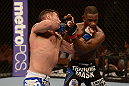 LAS VEGAS, NV - FEBRUARY 02:  (L-R) Isaac Vallie-Flagg punches Yves Edwards during their lightweight fight at UFC 156 on February 2, 2013 at the Mandalay Bay Events Center in Las Vegas, Nevada.  (Photo by Donald Miralle/Zuffa LLC/Zuffa LLC via Getty Images) *** Local Caption *** Yves Edwards; Isaac Vallie-Flagg
