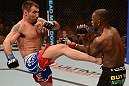 LAS VEGAS, NV - FEBRUARY 02:  (L-R) Isaac Vallie-Flagg kicks Yves Edwards during their lightweight fight at UFC 156 on February 2, 2013 at the Mandalay Bay Events Center in Las Vegas, Nevada.  (Photo by Donald Miralle/Zuffa LLC/Zuffa LLC via Getty Images) *** Local Caption *** Yves Edwards; Isaac Vallie-Flagg