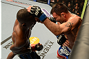 LAS VEGAS, NV - FEBRUARY 02:  (L-R) Yves Edwards punches Isaac Vallie-Flagg during their lightweight fight at UFC 156 on February 2, 2013 at the Mandalay Bay Events Center in Las Vegas, Nevada.  (Photo by Donald Miralle/Zuffa LLC/Zuffa LLC via Getty Images) *** Local Caption *** Yves Edwards; Isaac Vallie-Flagg