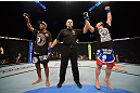 LAS VEGAS, NV - FEBRUARY 02:  Isaac Vallie-Flagg (right) reacts to his victory over Yves Edwards (left) during their lightweight fight at UFC 156 on February 2, 2013 at the Mandalay Bay Events Center in Las Vegas, Nevada.  (Photo by Donald Miralle/Zuffa LLC/Zuffa LLC via Getty Images) *** Local Caption *** Yves Edwards; Isaac Vallie-Flagg