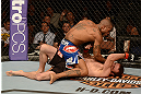 LAS VEGAS, NV - FEBRUARY 02:  Bobby Green (top) punches Jacob Volkmann during their lightweight fight at UFC 156 on February 2, 2013 at the Mandalay Bay Events Center in Las Vegas, Nevada.  (Photo by Donald Miralle/Zuffa LLC/Zuffa LLC via Getty Images) *** Local Caption *** Jacob Volkmann; Bobby Green