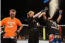 LAS VEGAS, NV - FEBRUARY 02:  Bobby Green (right) reacts to his victory over Jacob Volkmann (left) after their lightweight fight at UFC 156 on February 2, 2013 at the Mandalay Bay Events Center in Las Vegas, Nevada.  (Photo by Donald Miralle/Zuffa LLC/Zuffa LLC via Getty Images) *** Local Caption *** Jacob Volkmann; Bobby Green