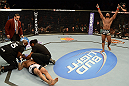 LAS VEGAS, NV - FEBRUARY 02:  Tyron Woodley (right) reacts to his knockout victory over Jay Hieron during their welterweight fight at UFC 156 on February 2, 2013 at the Mandalay Bay Events Center in Las Vegas, Nevada.  (Photo by Donald Miralle/Zuffa LLC/Zuffa LLC via Getty Images) *** Local Caption *** Jay Hieron; Tyron Woodley