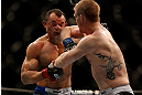 LAS VEGAS, NV - FEBRUARY 02:  (R-L) Evan Dunham elbows Gleison Tibau during their lightweight fight at UFC 156 on February 2, 2013 at the Mandalay Bay Events Center in Las Vegas, Nevada.  (Photo by Josh Hedges/Zuffa LLC/Zuffa LLC via Getty Images) *** Local Caption *** Gleison Tibau; Evan Dunham