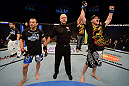 LAS VEGAS, NV - FEBRUARY 02:  Evan Dunham (right) reacts to his victory over Gleison Tibau after their lightweight fight at UFC 156 on February 2, 2013 at the Mandalay Bay Events Center in Las Vegas, Nevada.  (Photo by Donald Miralle/Zuffa LLC/Zuffa LLC via Getty Images) *** Local Caption *** Gleison Tibau; Evan Dunham