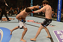 LAS VEGAS, NV - FEBRUARY 02:  (L-R) Demian Maia punches Jon Fitch during their welterweight fight at UFC 156 on February 2, 2013 at the Mandalay Bay Events Center in Las Vegas, Nevada.  (Photo by Donald Miralle/Zuffa LLC/Zuffa LLC via Getty Images) *** Local Caption *** Jon Fitch; Demian Maia