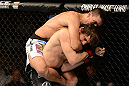 LAS VEGAS, NV - FEBRUARY 02:  Demian Maia (top) attempts to submit Jon Fitch during their welterweight fight at UFC 156 on February 2, 2013 at the Mandalay Bay Events Center in Las Vegas, Nevada.  (Photo by Donald Miralle/Zuffa LLC/Zuffa LLC via Getty Images) *** Local Caption *** Jon Fitch; Demian Maia